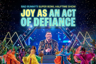 Bad Bunny performing on stage at Super Bowl LX surrounded by dancers in a vibrant Puerto Rican street scene