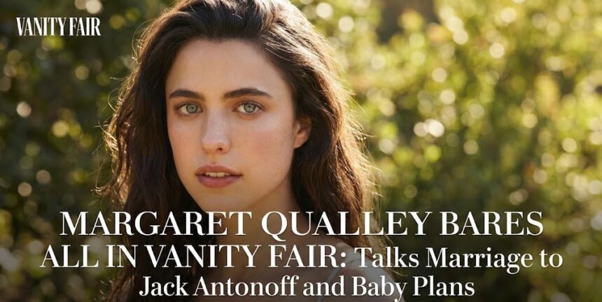 Margaret Qualley posing for Vanity Fair in a white towel with the I Love New York logo.