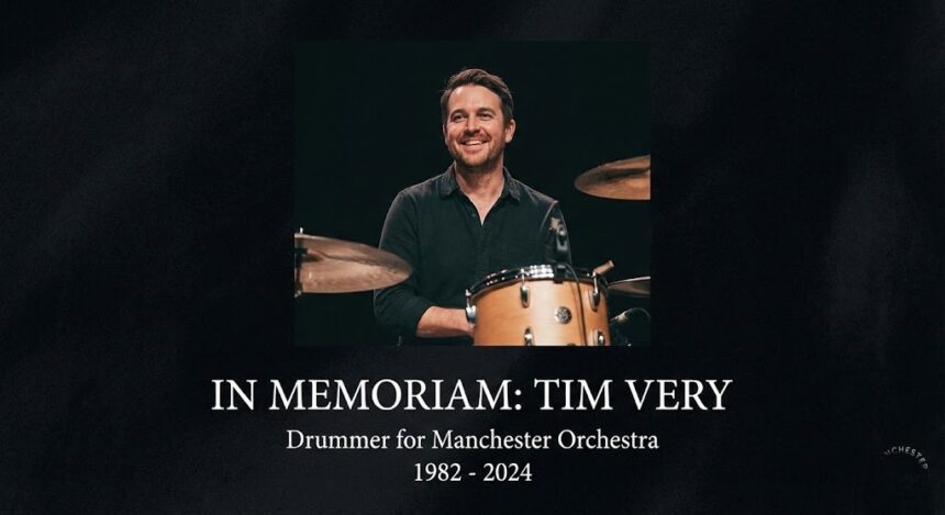 Manchester Orchestra drummer Tim Very performing live on stage.