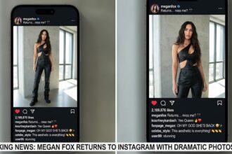 Actress Megan Fox wearing a black corset and spiked collar while posing on a studio floor.