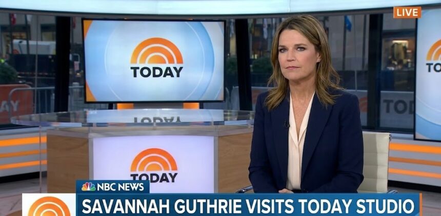 Savannah Guthrie hugging a colleague while wiping tears