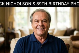A candid, heartwarming photograph of a smiling Jack Nicholson celebrating his 89th birthday, clapping alongside music legend Joni Mitchell, originally shared via his daughter's Instagram.