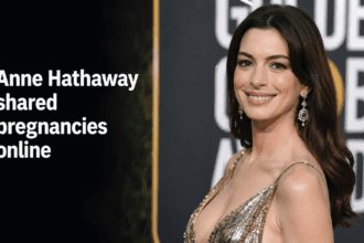 A professional high-fidelity close-up portrait photograph of actress Anne Hathaway smiling warmly against a clean minimalist studio backdrop.