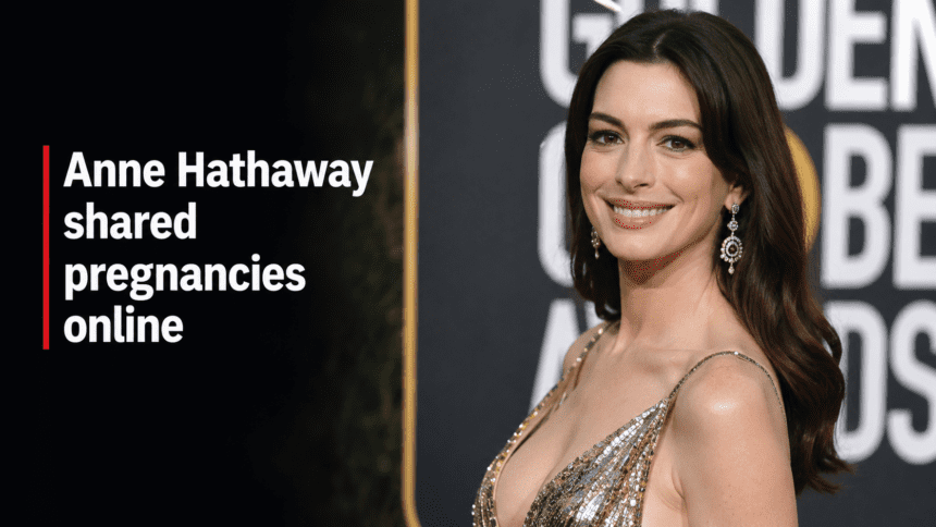 A professional high-fidelity close-up portrait photograph of actress Anne Hathaway smiling warmly against a clean minimalist studio backdrop.